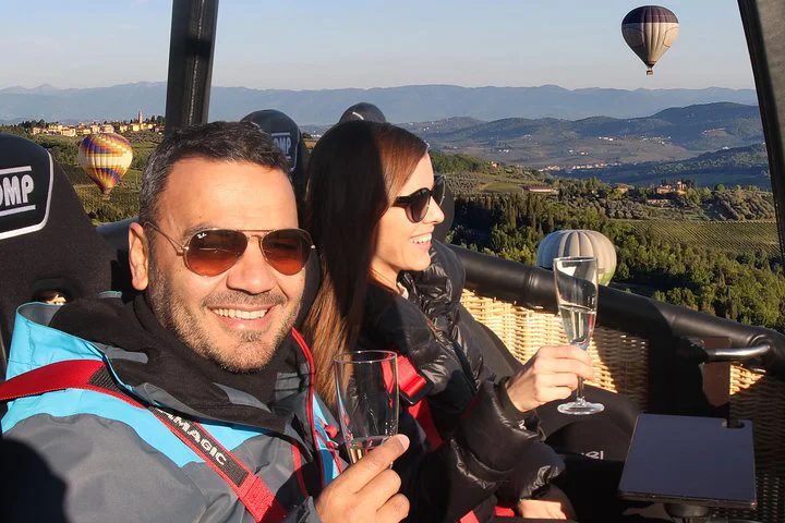 hot air balloon luxury flight with champagne over tuscany