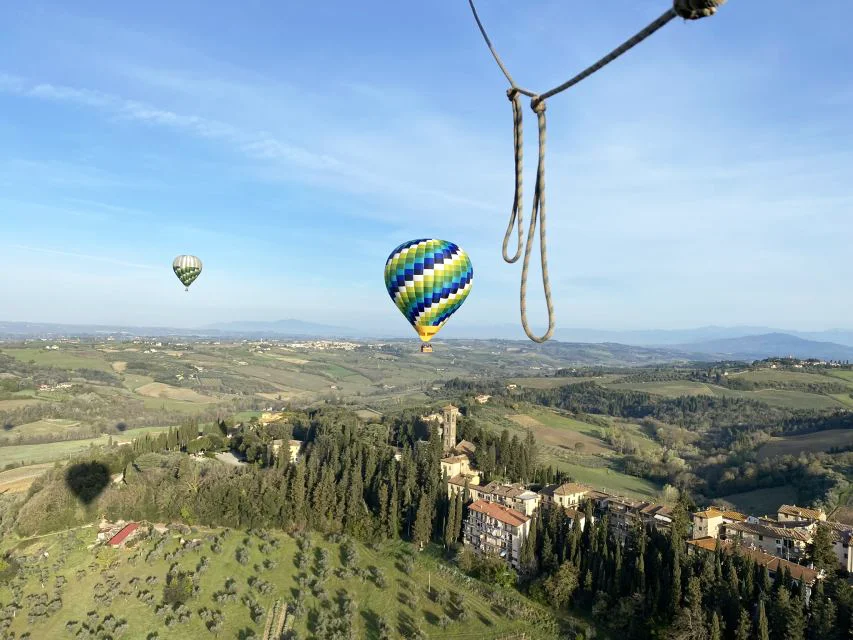 hot air balloons over val d'orcia